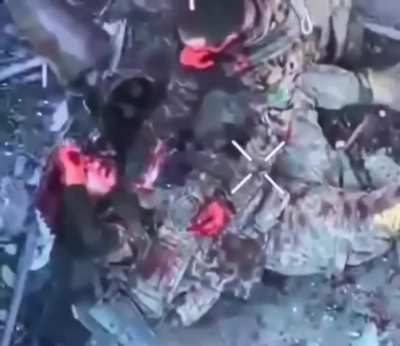 A drone captures the last moments of the hand-to-hand combat between the Ukrainian and Russian.