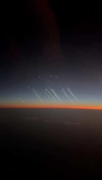 Airline passengers over Saudi Arabia captured the launch of ballistic missiles from Iran heading toward Israel.
