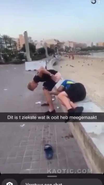 Dutch man shirts on sleeping tourist's head