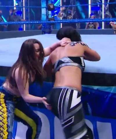 Nikki grabbing a handful of Bayley booty