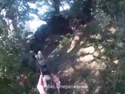Ukranians come across a few russians hanging upside down. 