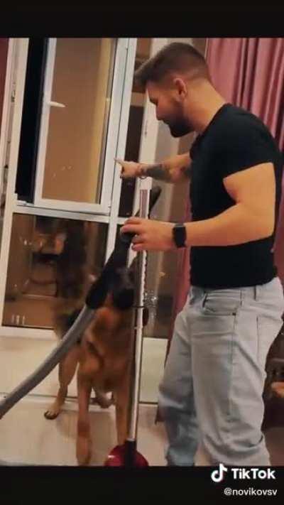 Saving him from the evil Vacuum Monster.