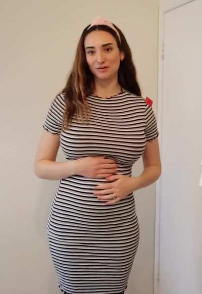 Imagine her already swollen tits becoming so heavy and milk-laden that when you give her teets a modest squeeze the milk leaks so profusely that it soaks through her clothing.