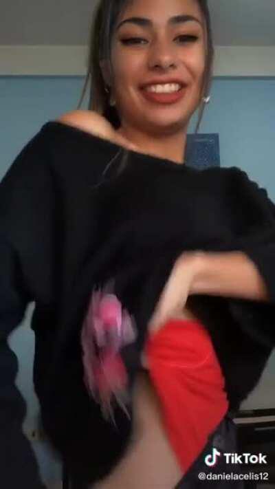 Wait for it. She shows her tattoo (wink wink)