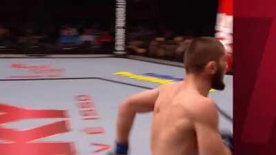 Khabib Nurmagomedov drops Thiago Tavares with a shovel hook / leaping uppercut and knocks him out with brutal elbows