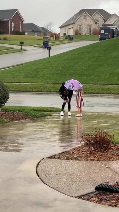 She waits for her sister no matter the weather
