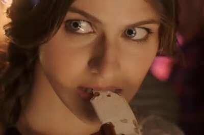 She can make biting a candy bar look sexy