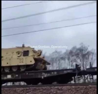 ua pov Bradley M2s seen moving on a train through Poland.