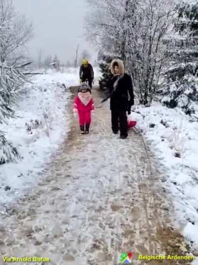 Cyclist knees a young child to get her out of his way
