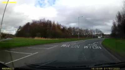 Idiot entering a roundabout at speed...