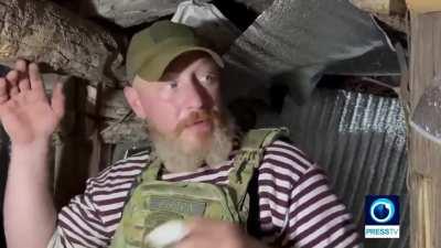 RU pov: British Press TV reporter interviews DPR soldier from Donbass in trench complex