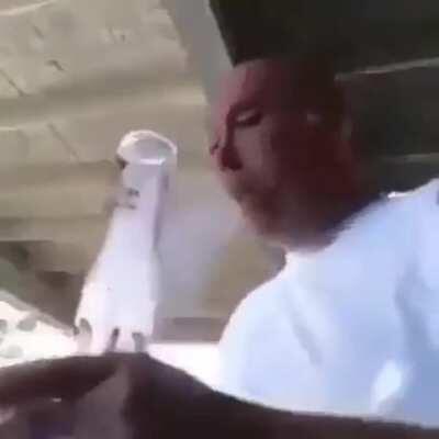 Dude attempts to bong rip a Carolina Reaper, nearly melts his lungs.