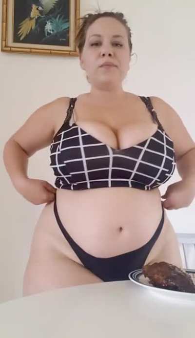 Stuffing her fat belly