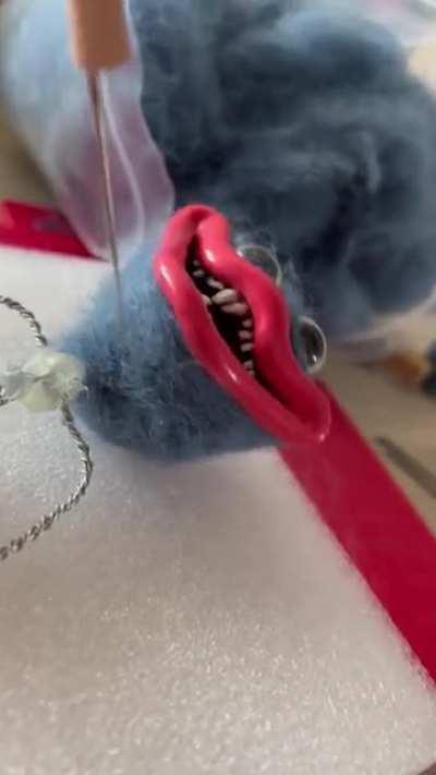 Combined 3D printing and needle felting to make this huggy wuggy puppet