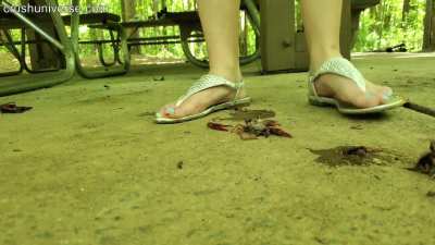 She skins them with her flat thong sandals