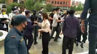 Chinese protestors clashing with Nepali police.