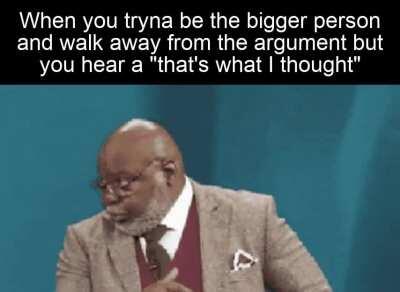 GIF of Man walking away then turning around and glaring over his glasses at whatever's on the left