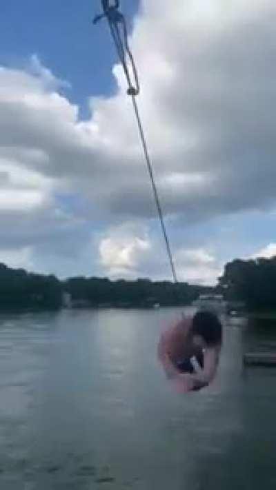 Backflip off the mast of a sailboat