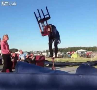 Hitting the table you're standing on with a chair