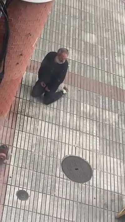 Spain drunken old man. after this he fell asleep next to the piss