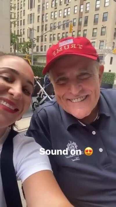 Taking a picture with Rudy Giuliani