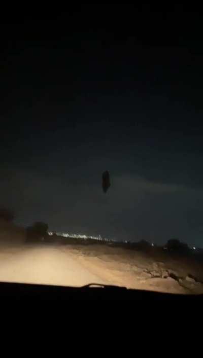 What’s this lady doing outside, up in the air in the middle of the night?