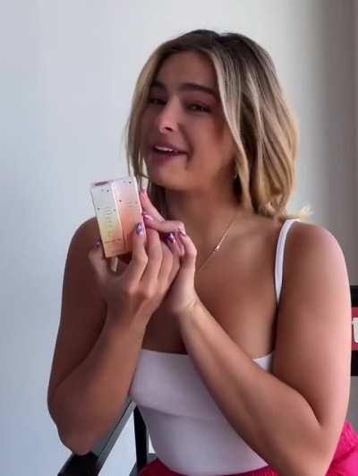 Cute in white tank top