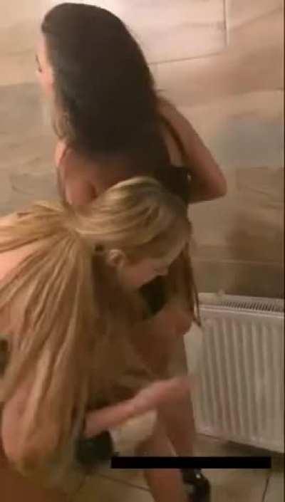 Lesbians have fun in toilets at the party
