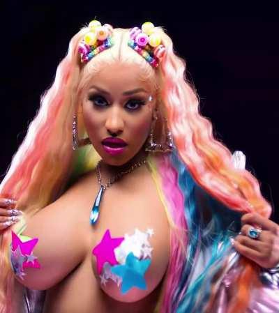 Nicki Minaj teasing her boobs