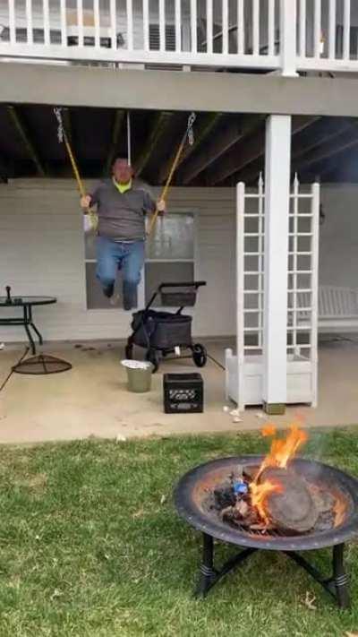 Adult swinging breaks into fire