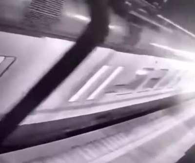 Main falls between carriages just as the train departs