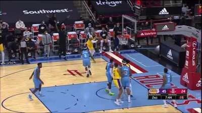 LeBron turns around and stares at the Lakers bench before draining the 3