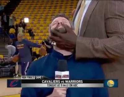 Shaq petting this dude's beard