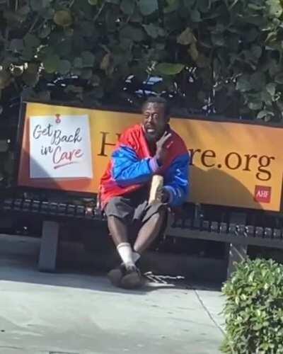 Homie just vibing at the bus stop