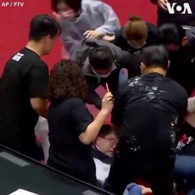Meanwhile at Taiwan lawmakers were throwing pig intestines at each other