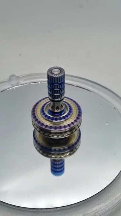 precision spinning top doing its thing! The contact point is a 1/8