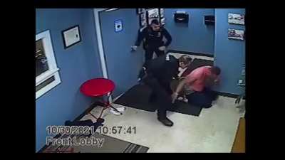 Cops taser a man covered in alcohol, which ends in flames. Cops then run and do nothing!