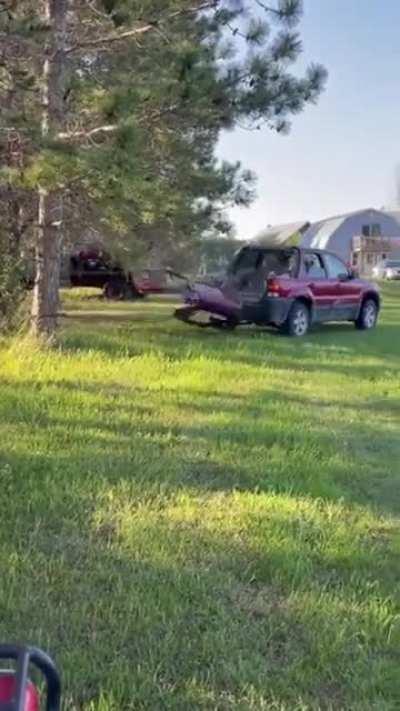 To uproot a tree with a SUV
