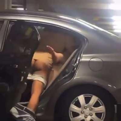 public orgy in a parking lot