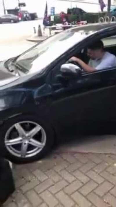 Spitting is assault, the guy in the car spit first