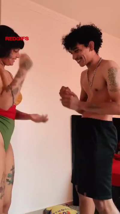 Casual cute couple play Rock Paper Scissors