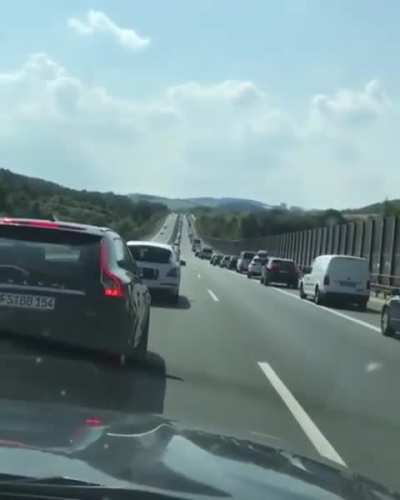 In Germany, when traffic slows or stops, it is the law to get to the side of the road. This allows emergency vehicles through.