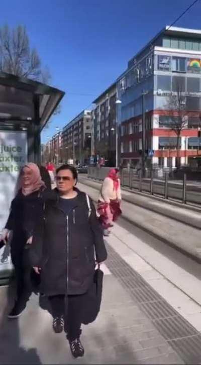 Two gypsy women throwing poop at each other