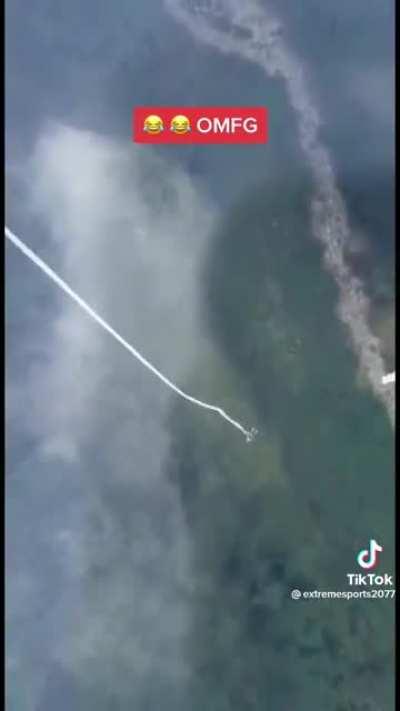 Guy jumps out of a plane? Idk very high up