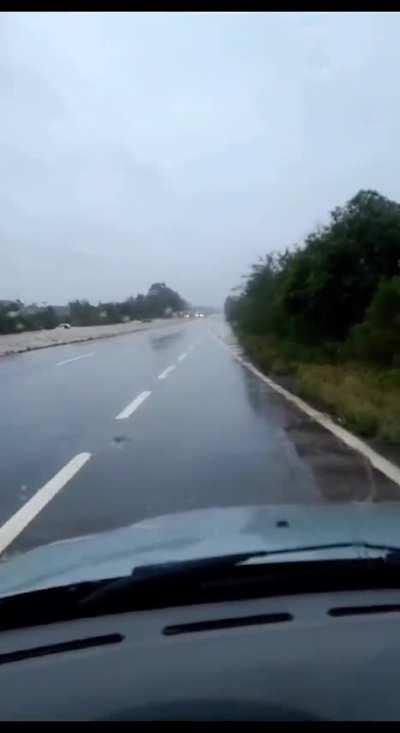 Recent floods in Brazil take police car for a ride