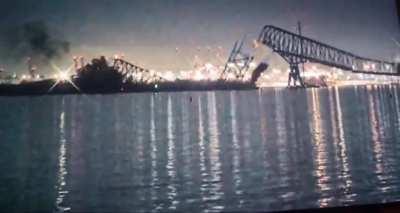 Moments ago a cargo ship struck a bridge in Maryland, destroying it. Mass casualties reported.