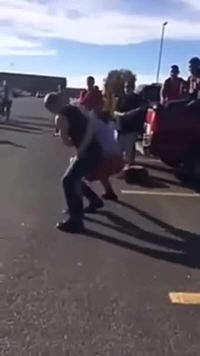 Guy gets suplexed on his head during fight