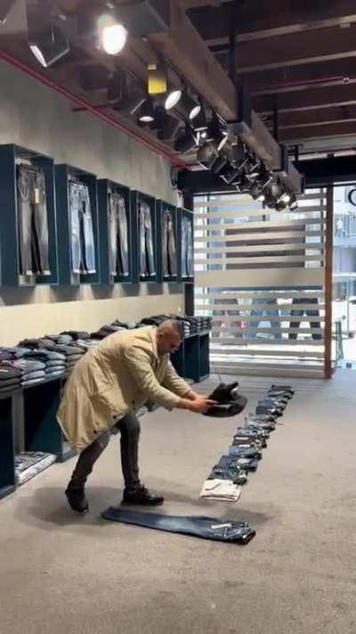 Witness someone truly at the top of the game - the Jeans Folding Game