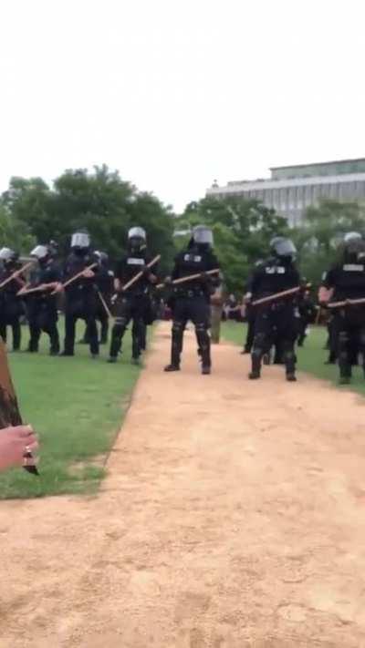 Innocent mediator yanked out of crowd of kneeling peaceful protesters and arrested for... being an empathetic human being?