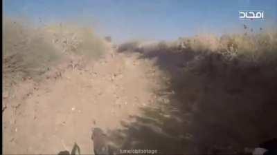 Close Quarters Combat: HTS jihadist almost raked by machine gun burt from an SAA solider. then Militants push up to eliminate the gunner. Ghouta, Syria Novemver 16th 2016